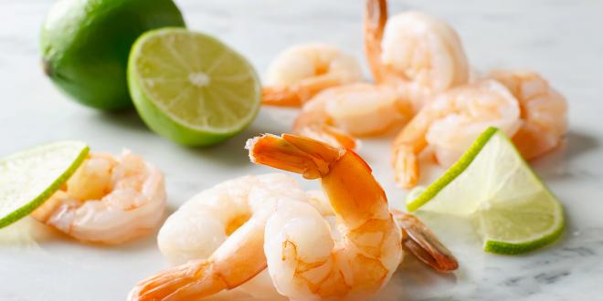 shrimp and sliced limes